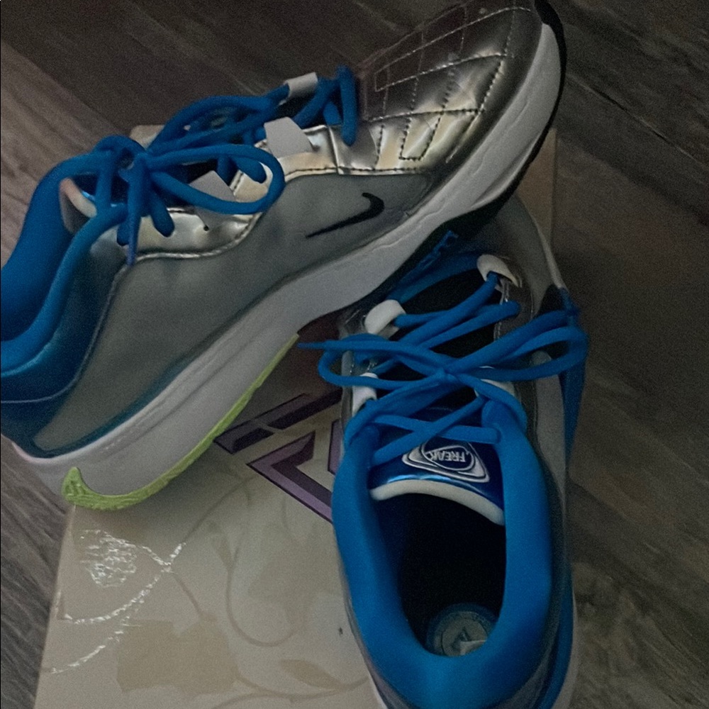Nike  Blue and Silver Sneakers - Picture 4 of 9